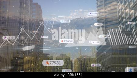 Displaying data visualizations over urban canyon, with line and area charts, numbers and icons Stock Photo