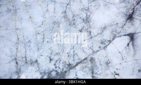 Cracked White Marble Stone Texture with Dark Veins Stock Photo