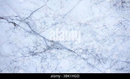 Cracked White Marble Stone Texture with Dark Veins Stock Photo