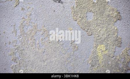 Grungy Blue-Grey Wall with Peeling Paint and Texture Stock Photo