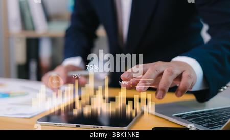 Business growth analysis, financial performance tracking, strategic future projections for market and success insights, Human interacts with a tablet Stock Photo