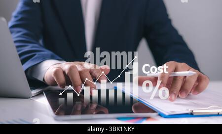 Businessman analyzes cost optimization and expense management using data driven insights for budget planning and digital transformation. Operational e Stock Photo