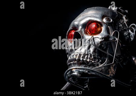 Skull of a human size robot isolated on black Stock Photo