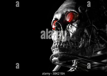 Skull of a human size robot isolated on black Stock Photo