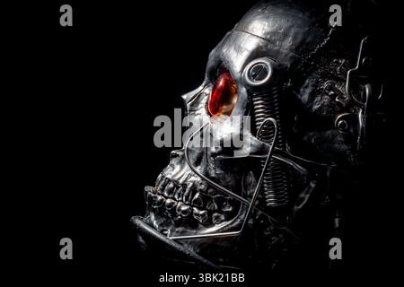 Skull of a human size robot isolated on black Stock Photo