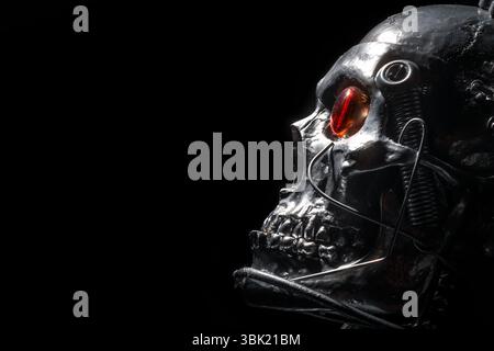 Skull of a human size robot isolated on black Stock Photo