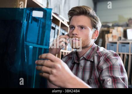 man worker on the phone Stock Photo