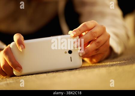 Woman taking photos with her phone closeup photo Stock Photo
