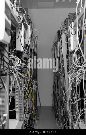 Modern computer cases in a data center Stock Photo