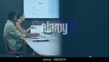 Analyzing graphs professionals gesturing at laptop, tablet, documents in meeting room, copy space Stock Photo