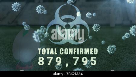 Displaying biohazard symbol with TOTAL CONFIRMED 879,795 on pitch with virus particles, teed ball Stock Photo