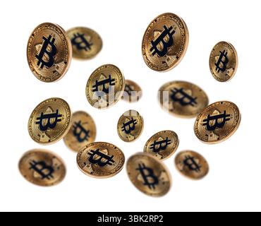 Cryptocurrency. Golden bitcoins falling on white background Stock Photo