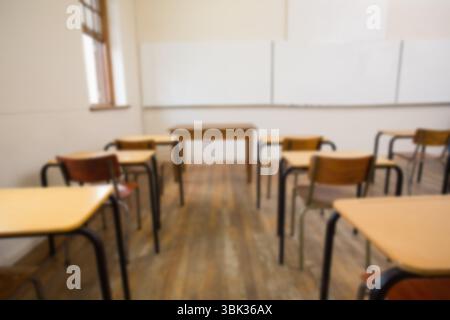 Flat design classroom interior showing student desks and chairs facing whiteboard with window light Stock Photo