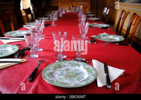 able set for lunch in a dining room. Stock Photo
