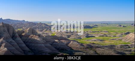 Panoramic view of rock formations and grasslands at Badlands National Park, South Dakota, USA. Stock Photo