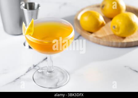 Paper plane cocktail i on white marble Stock Photo