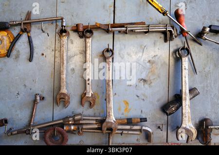 Old tools in a garage. Car repair. Kontum. Vietnam. Stock Photo