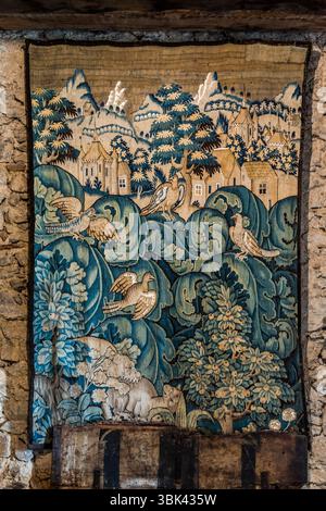 Château de Boussac, Creuse, the tapestries from the Tapestry Centre in Aubusson are one of the highlights. The château displays both medieval and contemporary tapestries. If a tapestry has a blue border, it means it was made in Aubusson. Chemin du Grand Moulin, Boussac, Nouvelle-Aquitaine, France Stock Photo