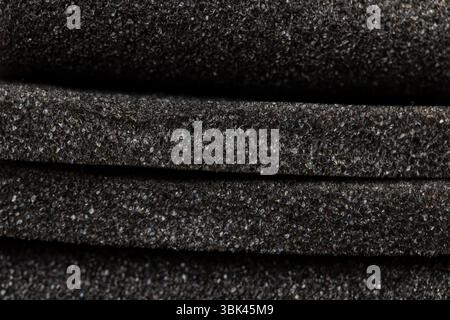 soft foam of black color for safe packaging of objects and products, foamy soft foam for giving elasticity to objects or sound insulation or as a pack Stock Photo