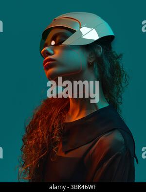 Woman in 3D robotic helmet with glowing red contour highlights. Futuristic music visuals, ads, album cover Stock Photo