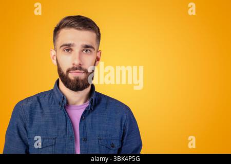 Portrait of charismatic bearded young man in casual clothes look Stock Photo