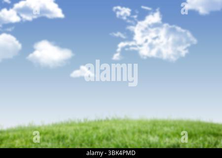 Green grassy hill is stretching across flat design meadow with fluffy clouds drifting overhead Stock Photo