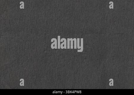 Dark gray textured surface is filling frame in flat design while showing fabric weave, copy space Stock Photo