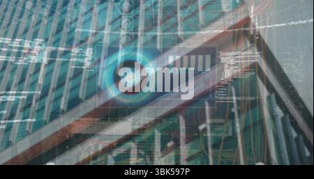 Displaying circular HUD interface merging high-rise exterior with data rack, bar charts and code Stock Photo