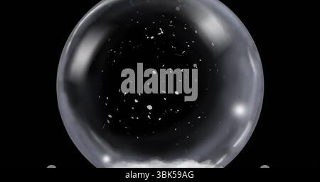 Displaying translucent sphere holding white particles in black studio void, with interior mist Stock Photo