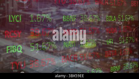 Displaying financial overlay over urban night cityscape with floating tickers and glowing lines Stock Photo