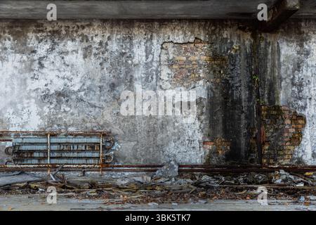 Abandoned damaged building wall closeup photo Stock Photo
