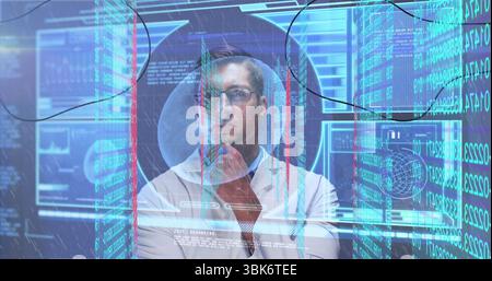 Analyzing male scientist studying holographic data in high-tech lab, featuring transparent screens Stock Photo