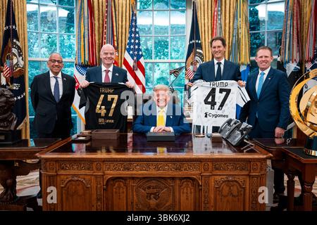 United States President Donald J Trump poses for a photo with Carlos Cordeiro, former president of the US Soccer Federation, left, FIFA president Gianni Infantino, second left, and others after meeting with the Juventus soccer club in the Oval Office of the White House in Washington, DC, US, Wednesday, June, 18, 2025, Credit: Doug Mills/Pool via CNP/MediaPunch Credit: MediaPunch Inc/Alamy Live News Stock Photo