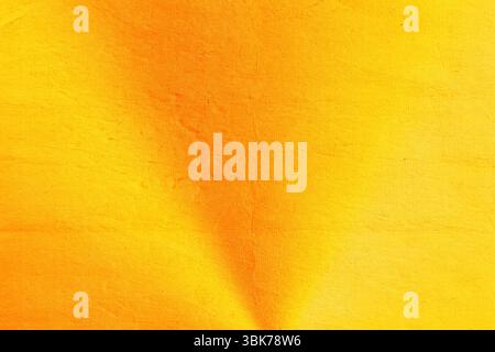 Textured yellow-orange surface is being shown in digital illustration with warm gradient creases Stock Photo