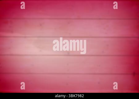 Red wooden panels are showing blurred horizontal grain with soft vignette in flat design Stock Photo