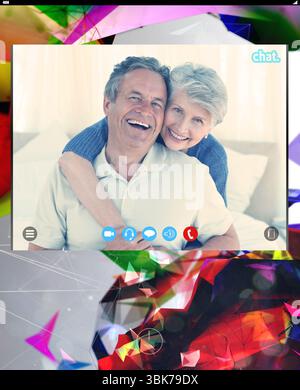 Portrait of happy caucasian senior couple embracing on laptop screen during video call, copy space Stock Photo