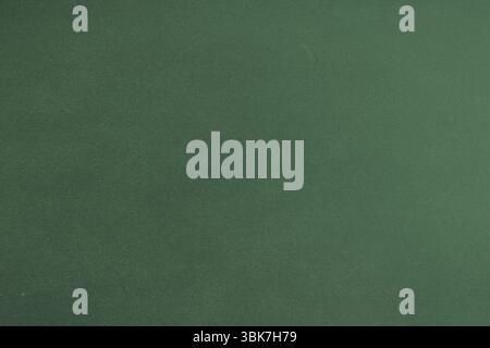 Green textured surface is covering entire frame in flat design, showing subtle shading, copy space Stock Photo