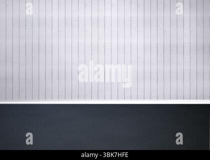 Blank lined notebook sheet is lying in flat-lay view contrasting dark charcoal textured surface Stock Photo