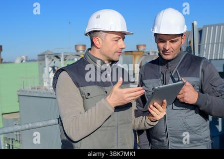 construction specialist using a tablet computer Stock Photo