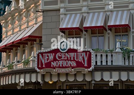 Exterior shot of the "New Century Notions" store, featuring red awnings and detailed architecture in a classic style at Disneyland Paris, France. Stock Photo