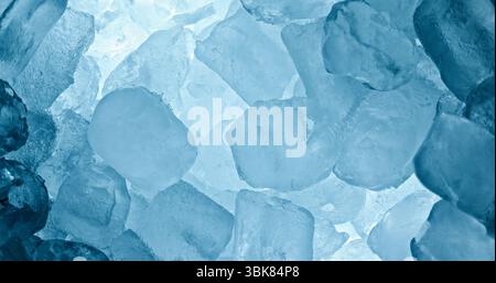 Ice cubes piled up top view as background texture Stock Photo