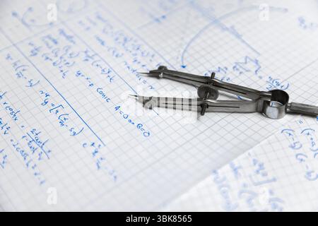 Written Math exercise in notebook closeup Stock Photo