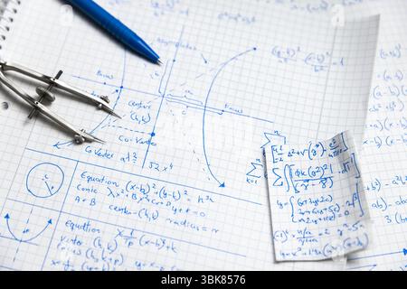 Written Math exercise in notebook close up Stock Photo