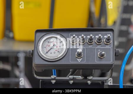 Pressure Gauge On Off Switch Board Control Panel at Agricultural Sprayer Machine Stock Photo