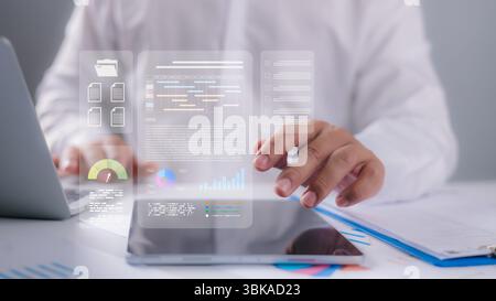 Human interacts with a digital interface showing analytics, charts, project tools, Business intelligence, data analysis, workflow optimization. Corpor Stock Photo