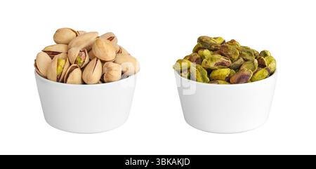 Two white bowls with pistachio nuts with shell and without isolated cutout on white Stock Photo