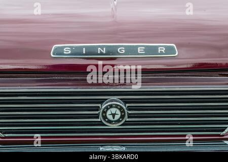 Singer Junior Radiator Close up of the radiator grille and badges of a 1965 Sunbeam Alpine ...
