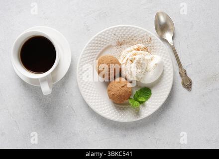 Tiramisu Mini Balls for dessert with coffee on light table, top view Stock Photo
