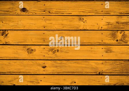 Horizontal wooden planks are displaying warm grain knots and nail holes with transparent background Stock Photo