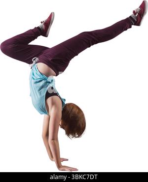 Female is doing split-leg handstand in flat design, wearing tank top, burgundy sneakers, copy space Stock Photo